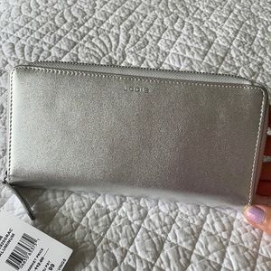 Lodi’s silver clutch wallet